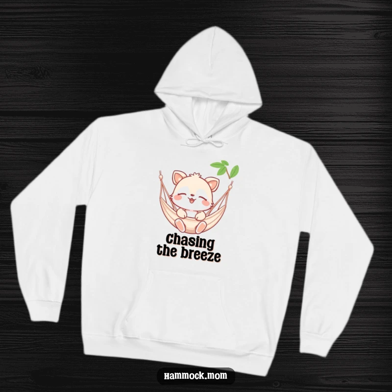Funny hoodie showcasing a happy animal character with eyes closed, enjoying a gentle hammock breeze, ideal for cozy relaxation.