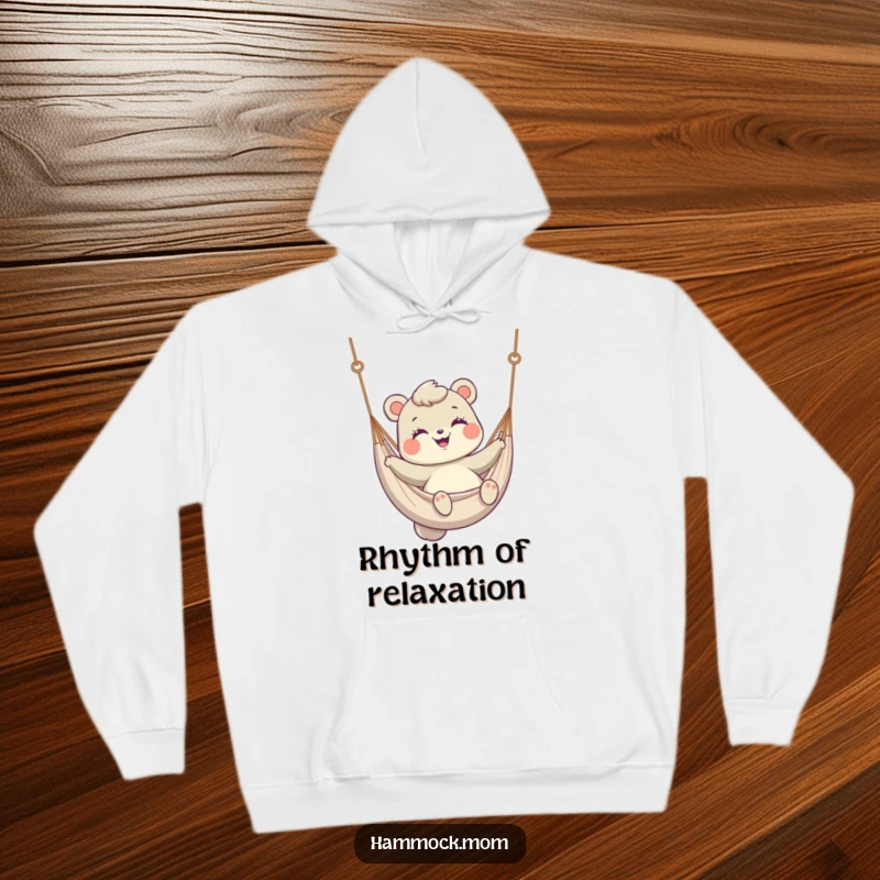 Funny Hoodie with a mom animal smiling while gently swinging in a hammock, promising cozy happiness.