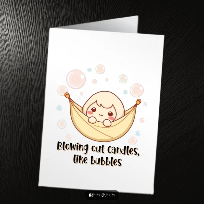 Funny Free Printable Birthday Card: Kawaii hammock character blissfully floating amidst gentle, iridescent bubbles in a relaxed state.